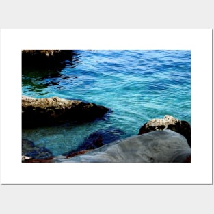 Blue waters of the Adriatic sea washing some stones Posters and Art